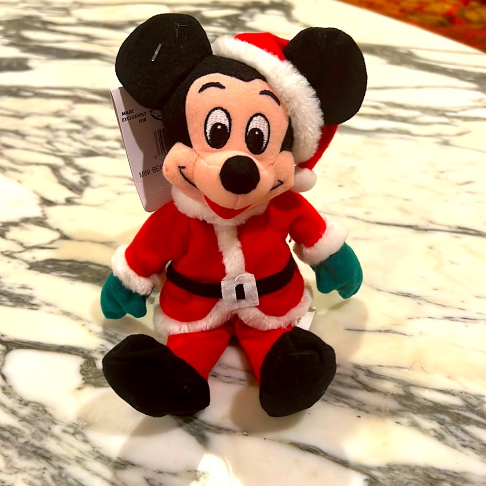 NWT Disney store Christmas Mickey beanie plus. Santa Mickey.